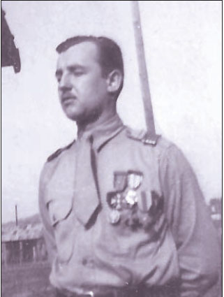 Leon Hloba with medals received from the French