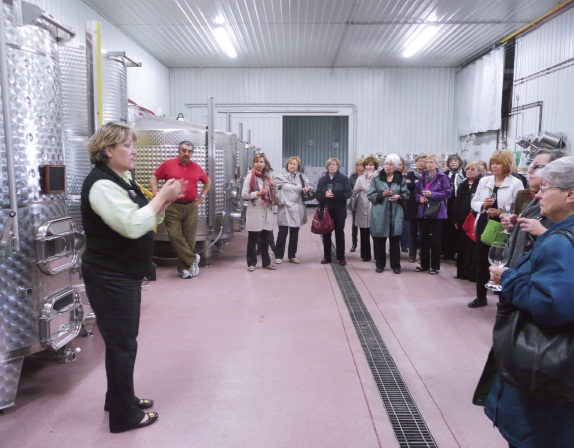 1 - Rosewood Estates' Renata Roman conducts a tour of the wine production facilities