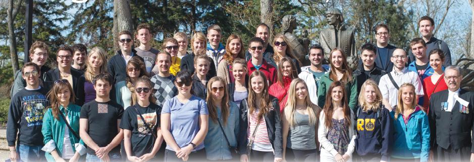 1 - SUSK delegates pose with Speaker Gene Zwozdesky in front of the Ukrainian Immigrant Monument at the Alberta Legislature