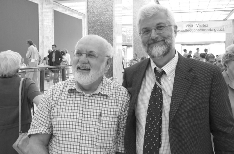 1-      Myron Momryk (L) shares a laugh with Peter De Lottinville, Director of the Political and Social Archives at LAC