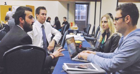 1 – Delegates work together during a seminar to resolve issues facing SUSK.