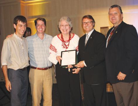 1 - L. to R.: Slawko Borys, MP Bernard Trottier, Daria Diakowsky, MP Ted Opitz, Taras Pidzamecky – with Canada's Certificate of Recognition for UNF 80th Anniversary