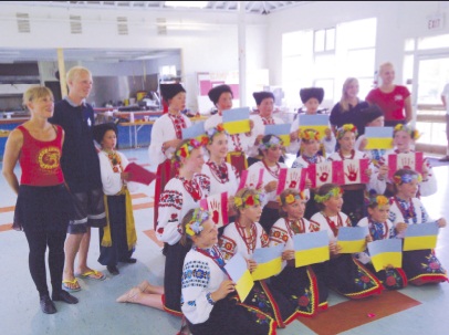 2 - UNF Sokil Ukrainian Dance Camp participants perform concert. Standing in back: Danovia Stechishine and Adrian Dziwik (L.). Tanya Vodoviz and Larissa Szahrajuk (R.)