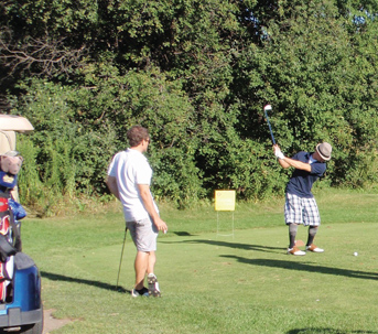 UNF Tournament golfers teeing-off on the greens