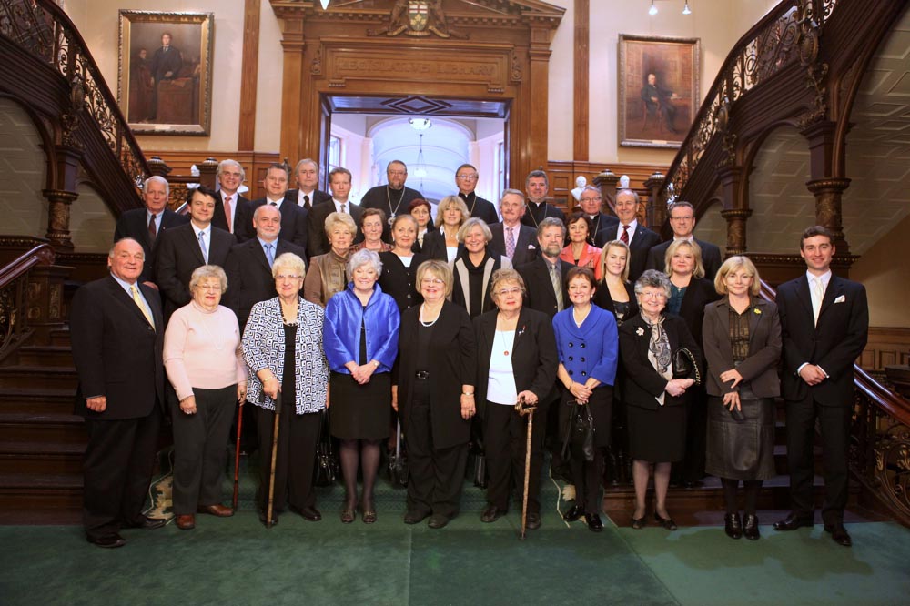 MPPs Gerry Martiniuk, Donna Cansfield and Cheri DiNovo join members of John Yaremko’s family, community leaders and Borys Wrzesnewskyj, MP, on the main steps of the Ontario Legislature after the tribute to John Yaremko