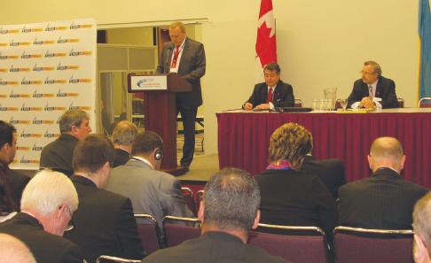 Opening of Canada Ukraine Business Forum with remarks by Marko Shevchenko, Charge d’Affaires, Embassy of Ukraine in Canada, and seated left to right, Forum Co-chair John Moskalyk and Zenon Potichny, CUCC President