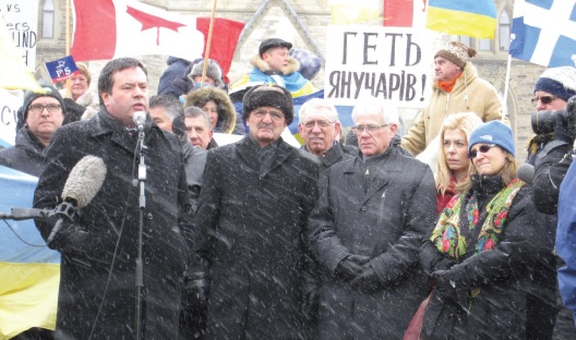 The Hon. Minister Jason Kenney addresses demonstrators in Ottawa on Jan 29, 2014. L. to R.: The Hon. Minister Jason Kenney, MP Wladislaw Lizon, MP Bob Dechert, MP Chrystia Freeland