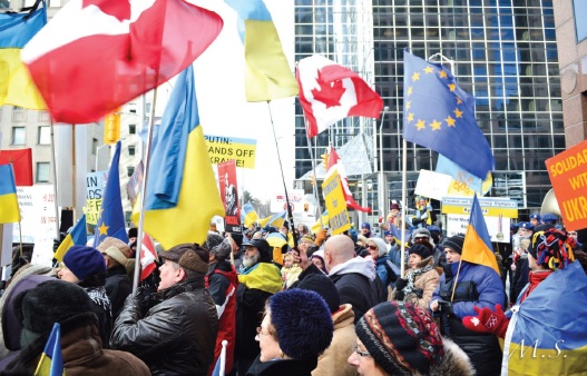 Demonstrators protest at the Russian Consulate in Toronto